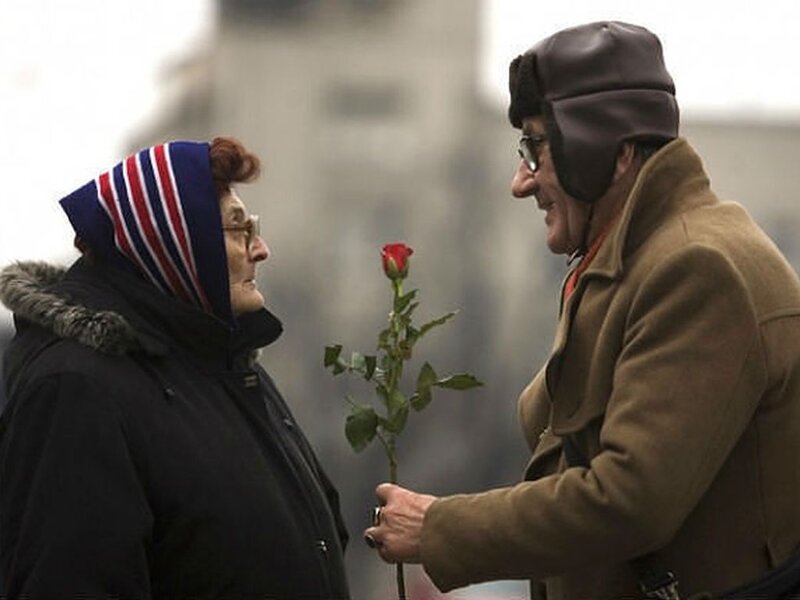 Elderly Couple with Rose