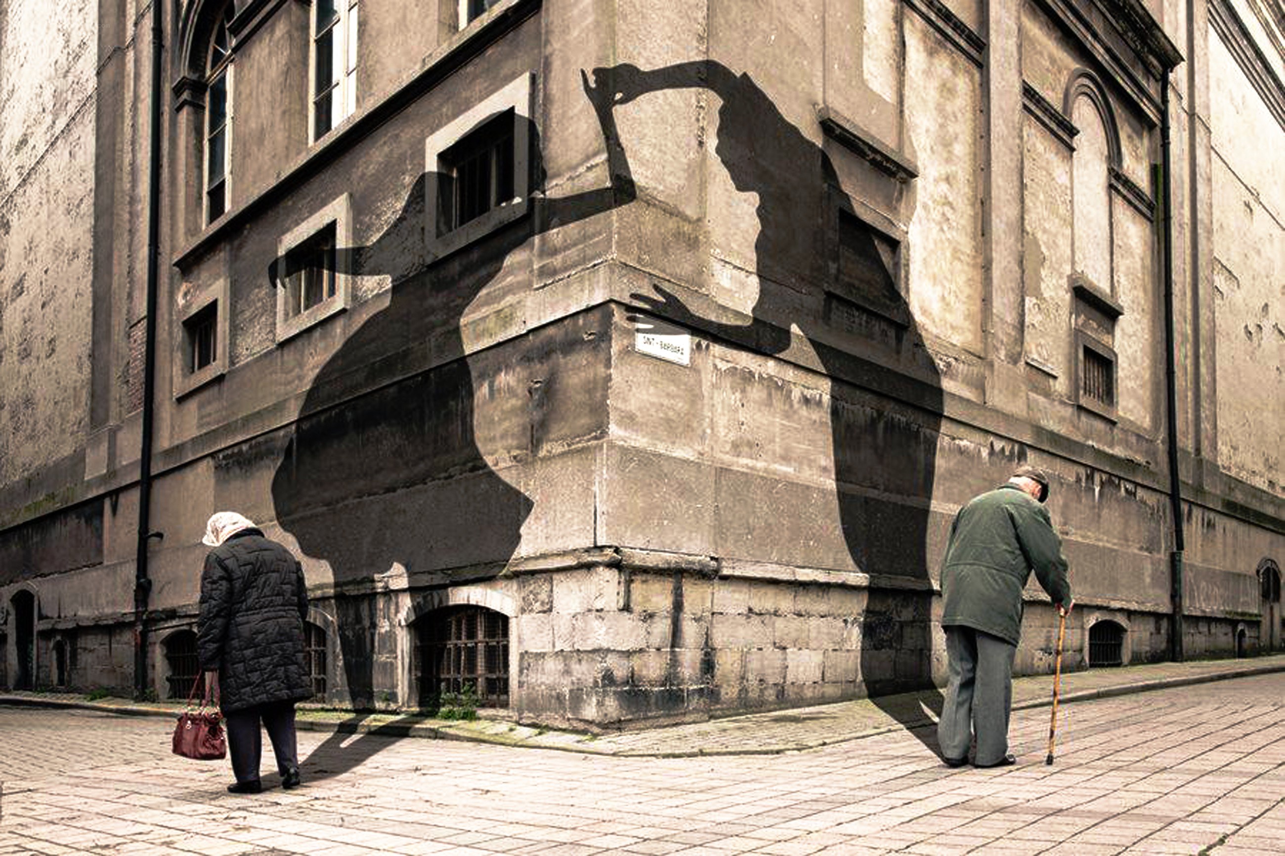 Elderly couple with shadow art