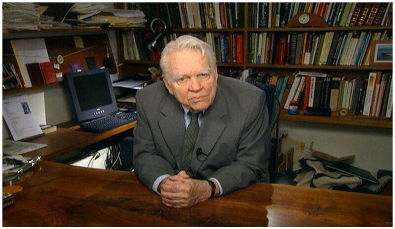 Elderly Man at Desk — Brown