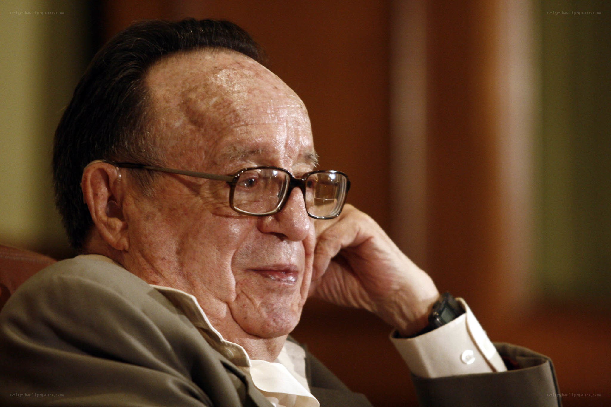 elderly man in glasses