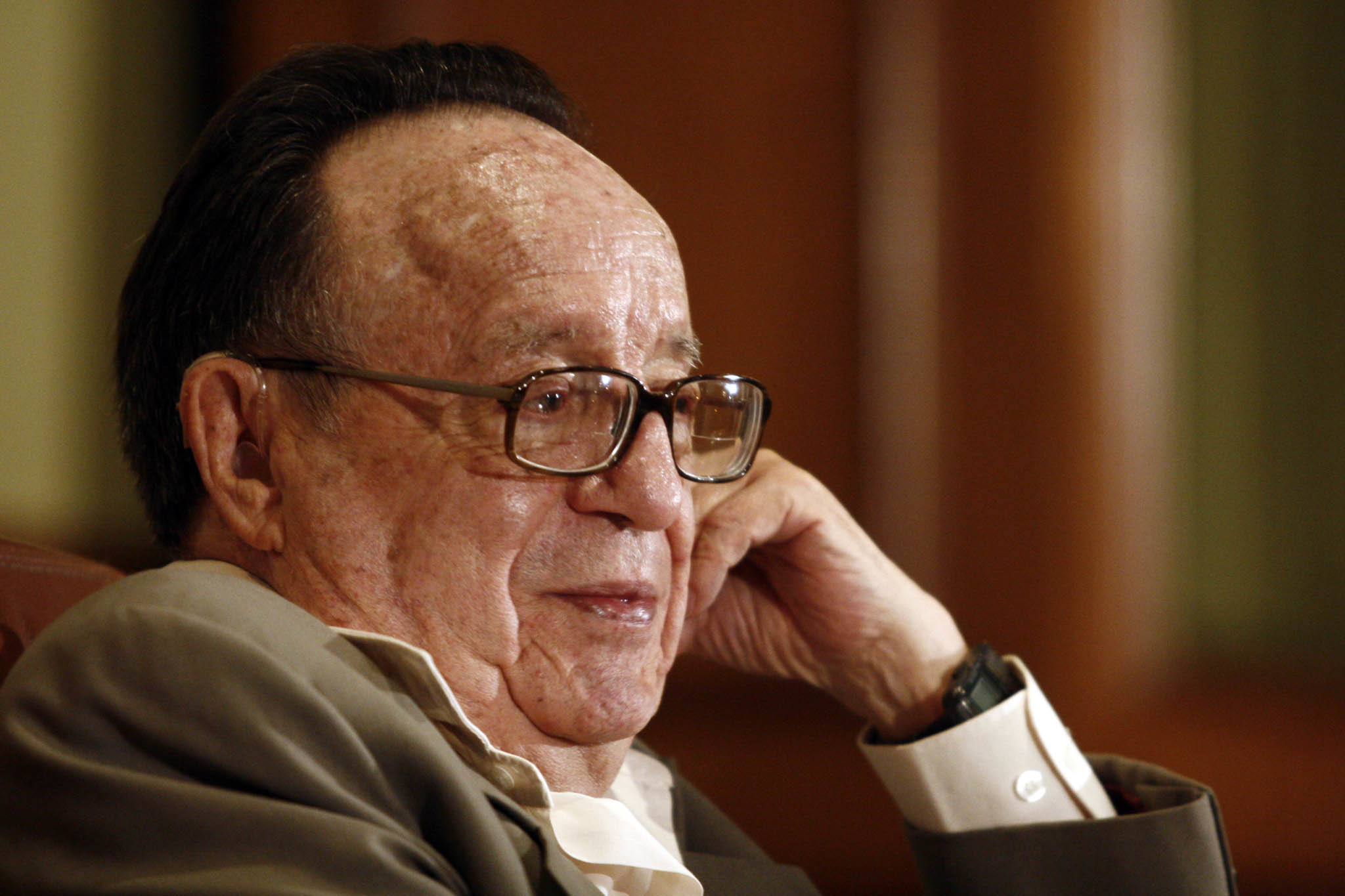elderly man in glasses