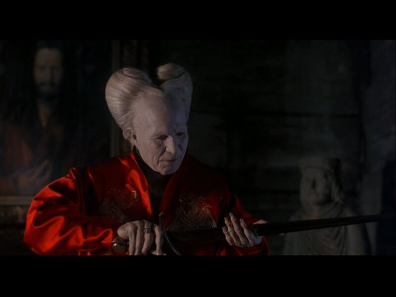 Elderly Man in Red Robe