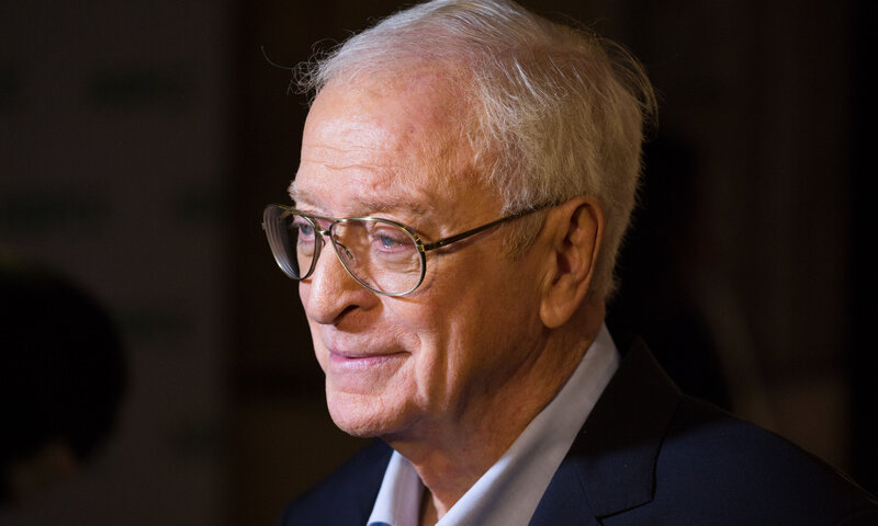 Elderly Man in Suit — Black
