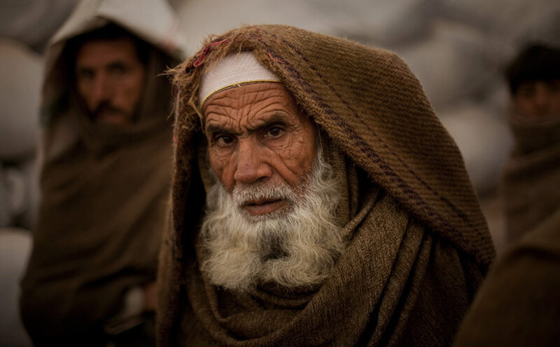 elderly man in traditional clothing