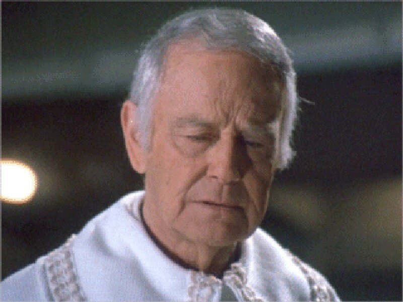 Elderly Man in White Robe