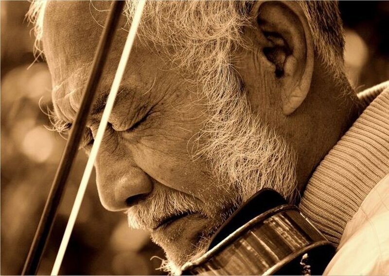Elderly Man Playing Violin