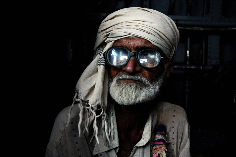 Elderly Man with Glasses — Black, Dramatic