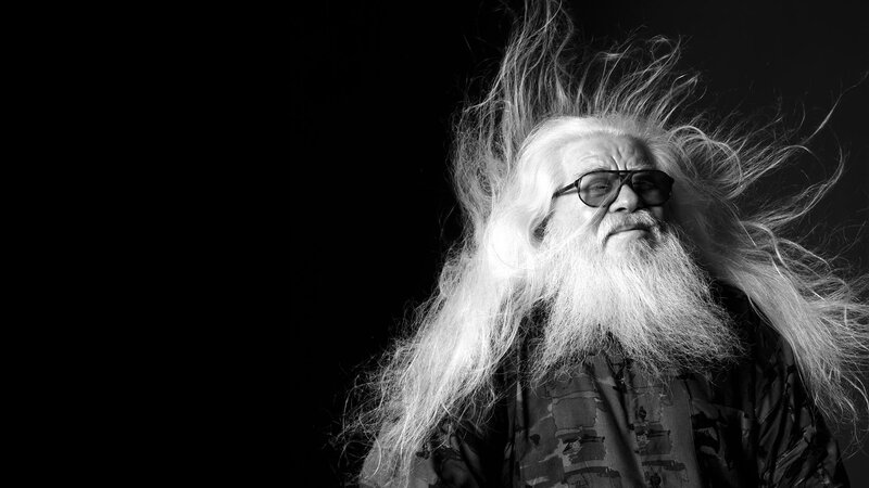 elderly man with long white hair