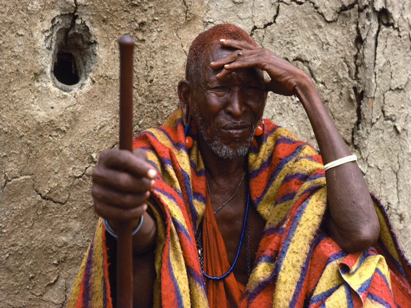 Elderly Man with Staff