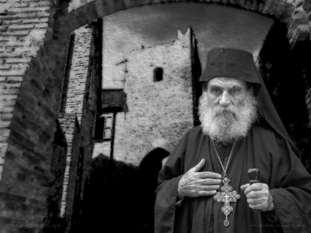 elderly monk in black and white