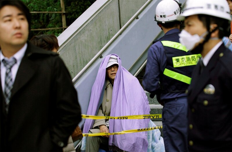 Elderly Person Wrapped in Blanket