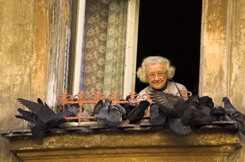 Elderly Woman at Window