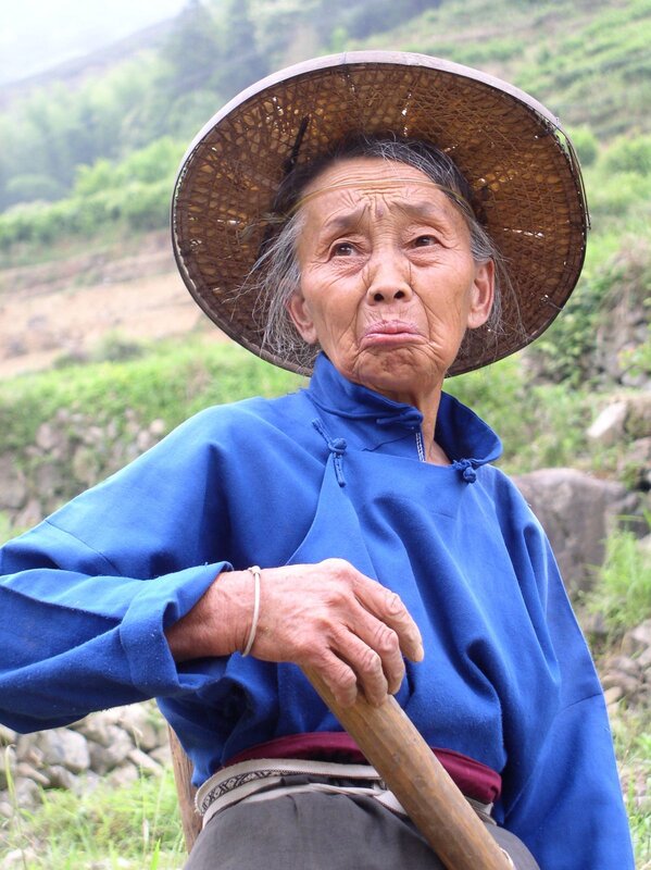 Elderly woman in rural setting