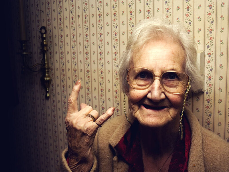 Elderly Woman Making Hand Gesture — Beige