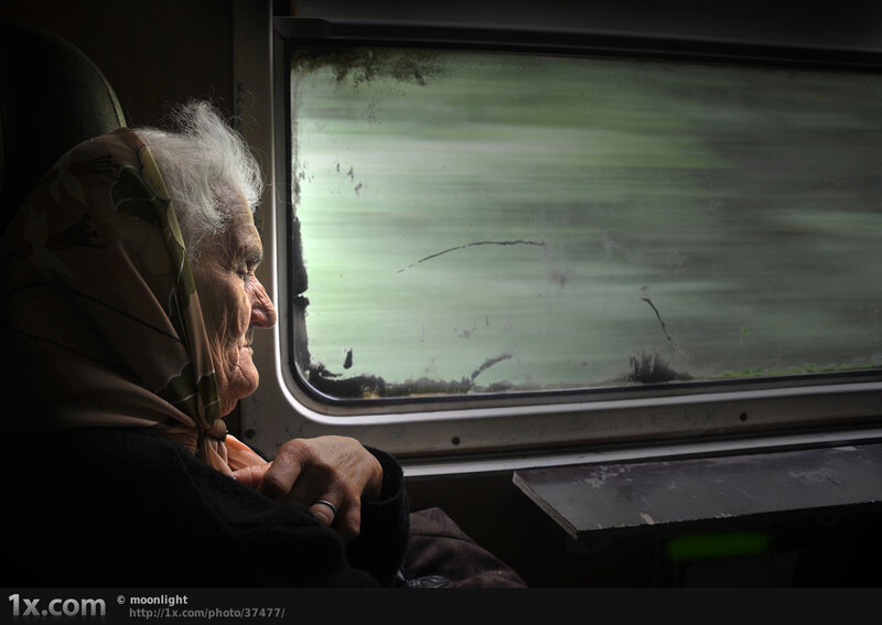 Elderly Woman on Train