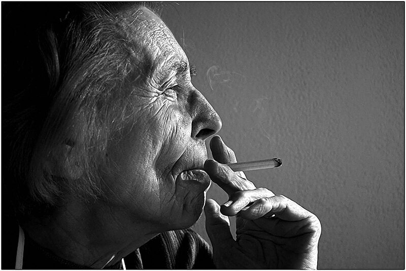 Elderly Woman Smoking — Black