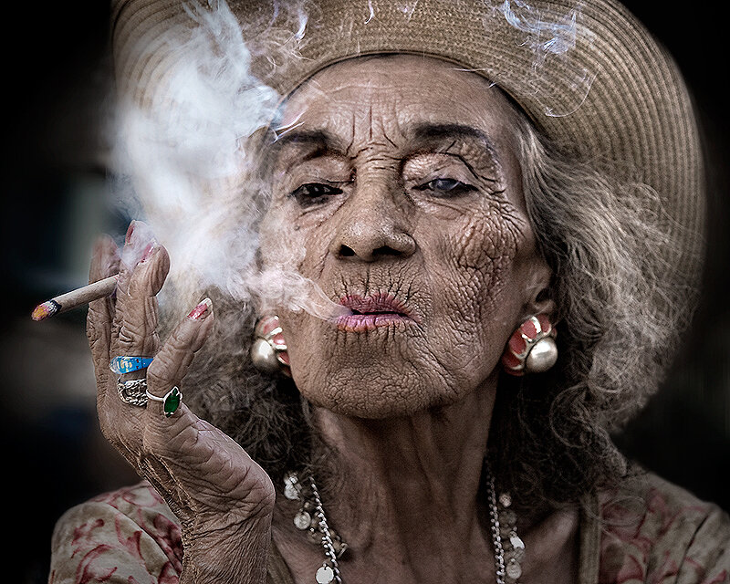 Elderly Woman Smoking — Brown, Dramatic
