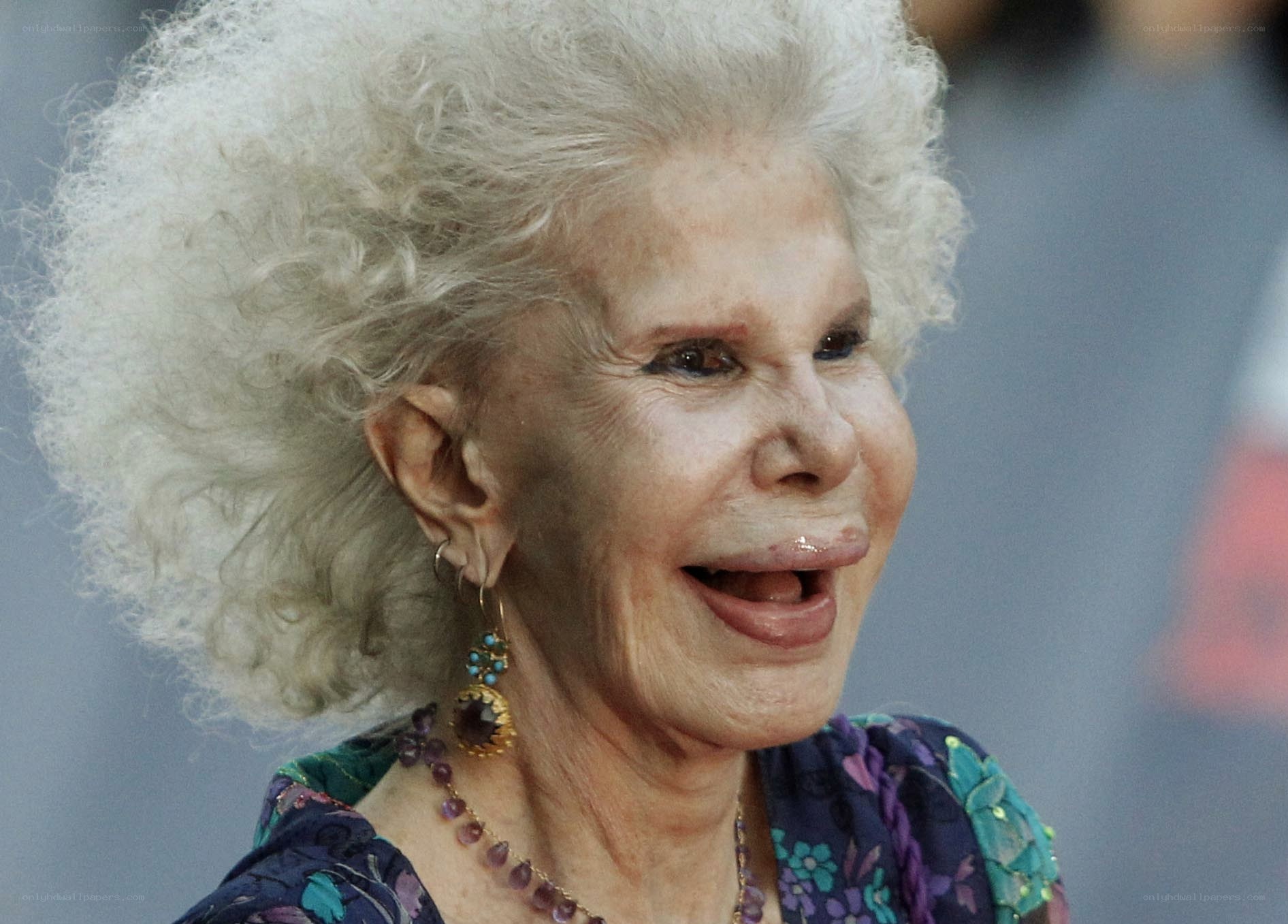 elderly woman with curly hair