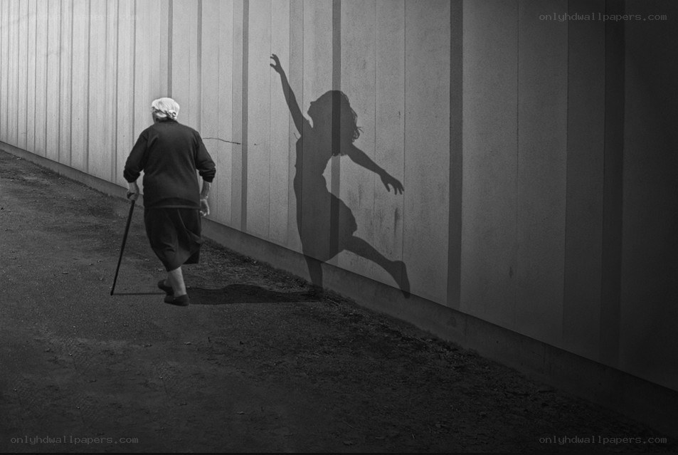 Elderly woman with dancing shadow