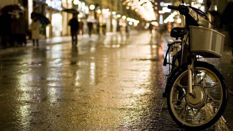 Electric Bicycle on Wet Street