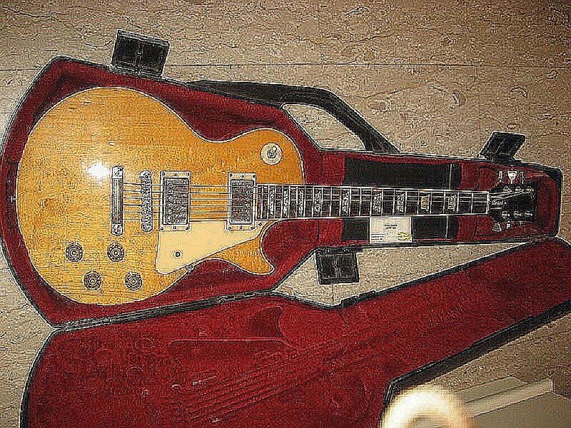 Electric Guitar in Case — Red