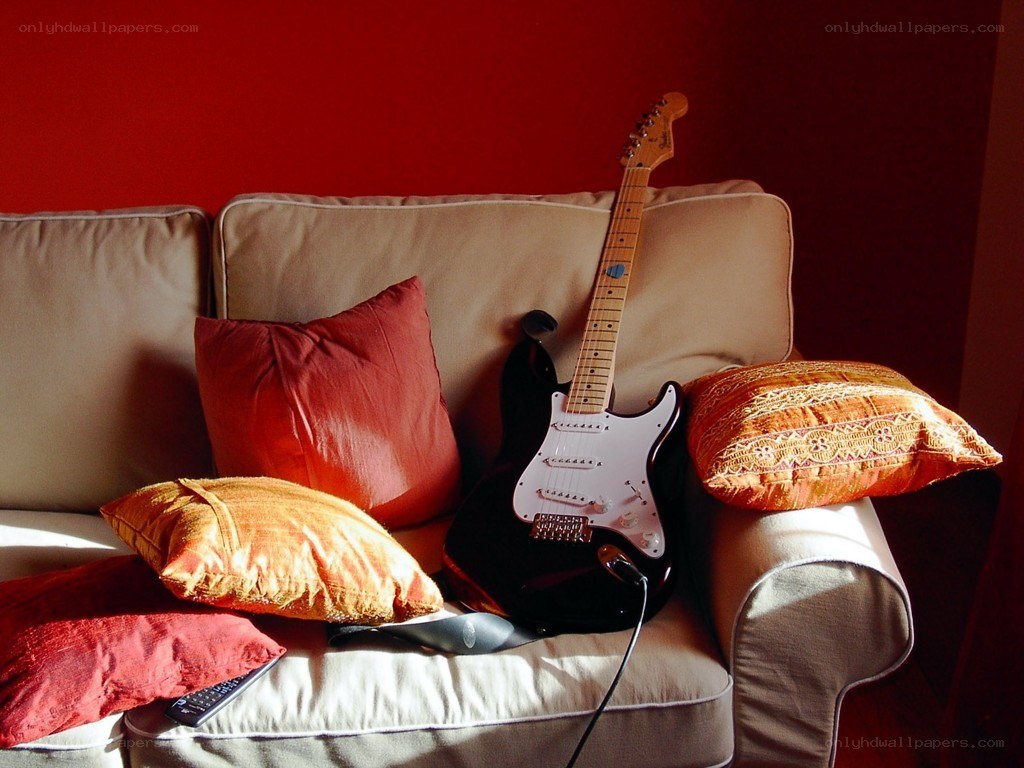 Electric guitar on a couch