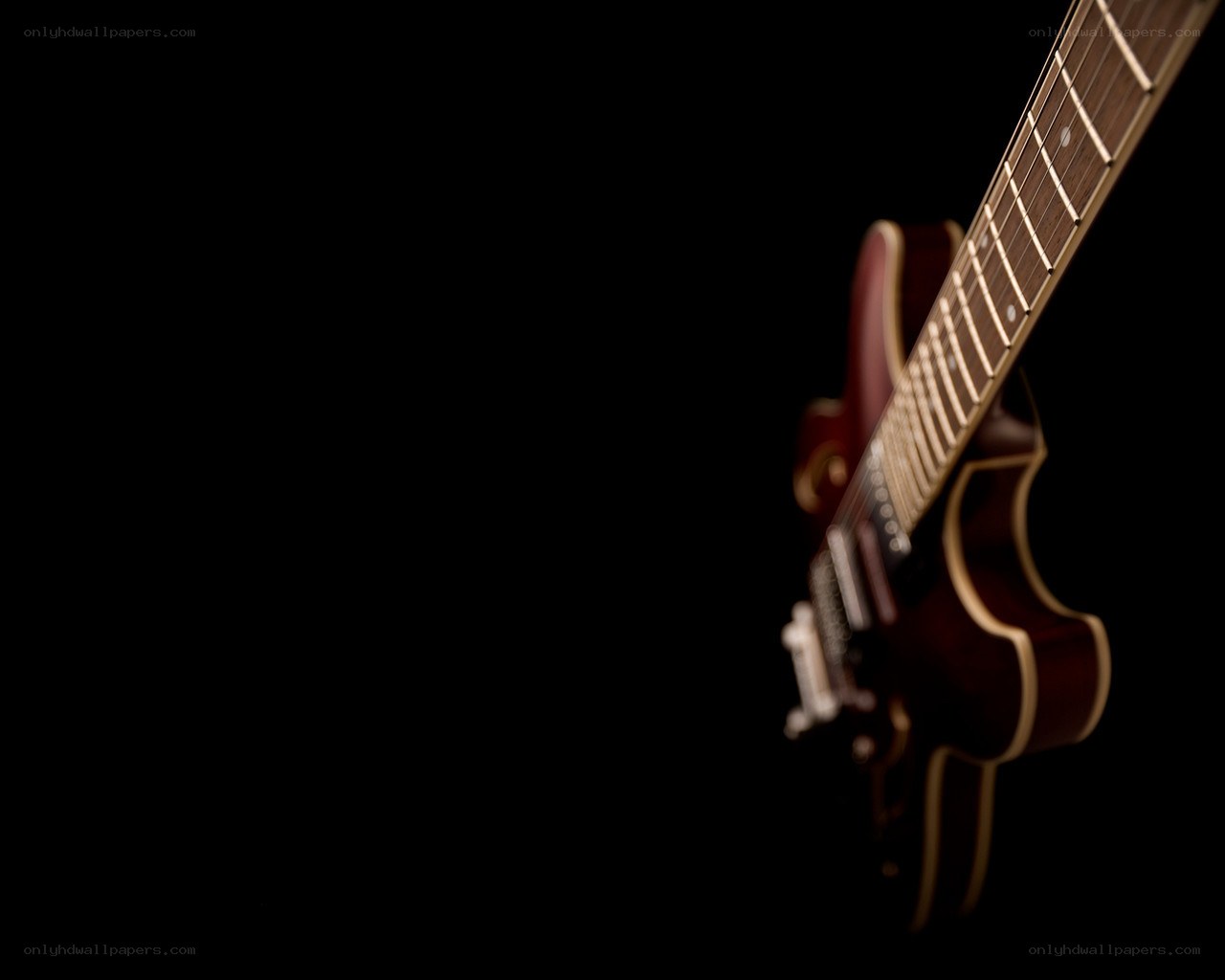 Electric guitar on black background