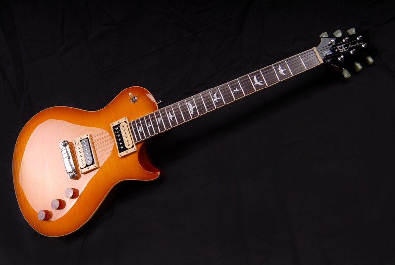 Electric Guitar on Black — Orange, Neutral