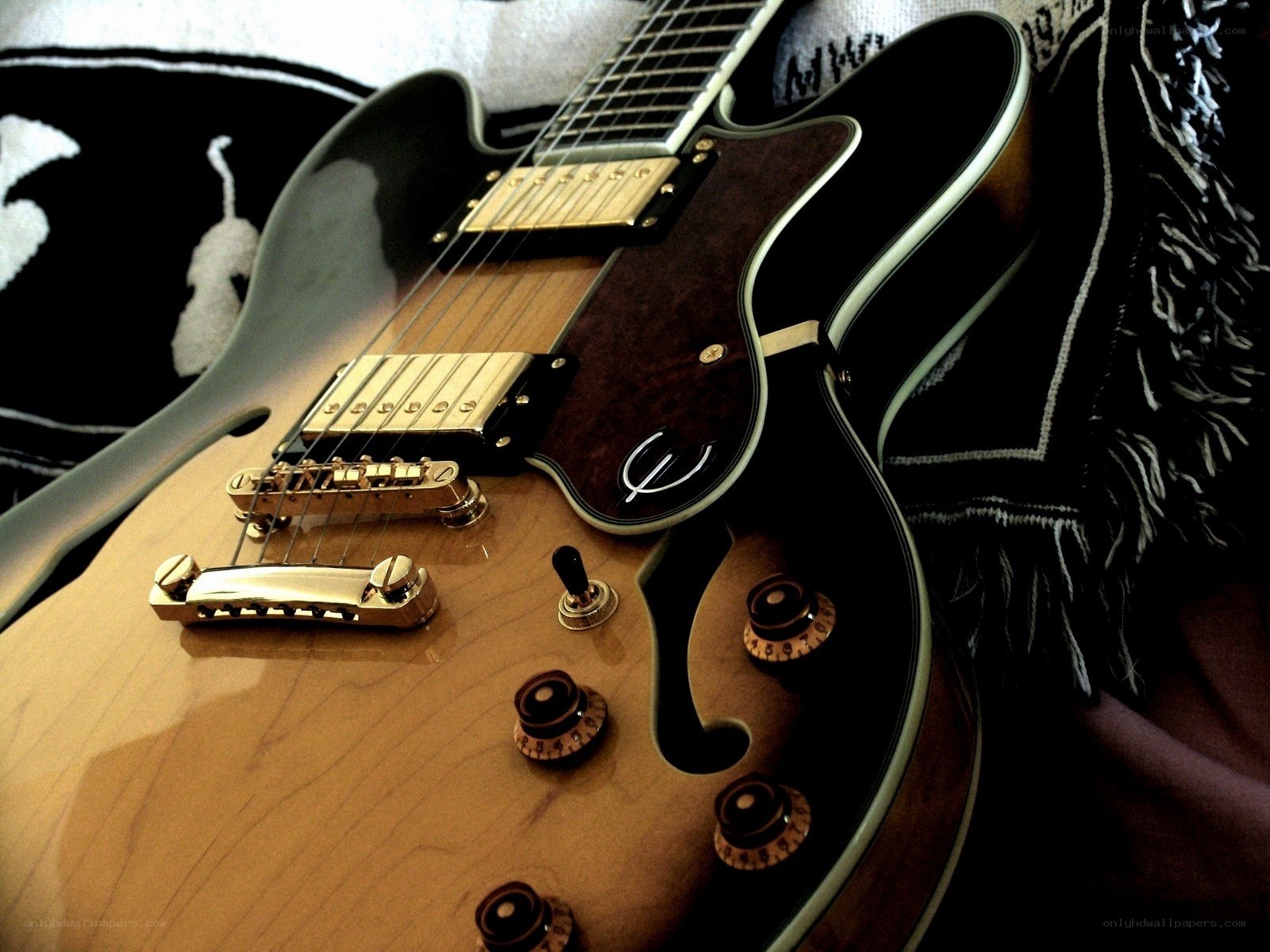 electric guitar on blanket