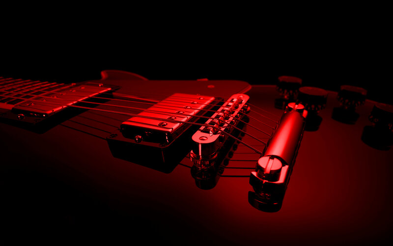 Electric guitar under red light