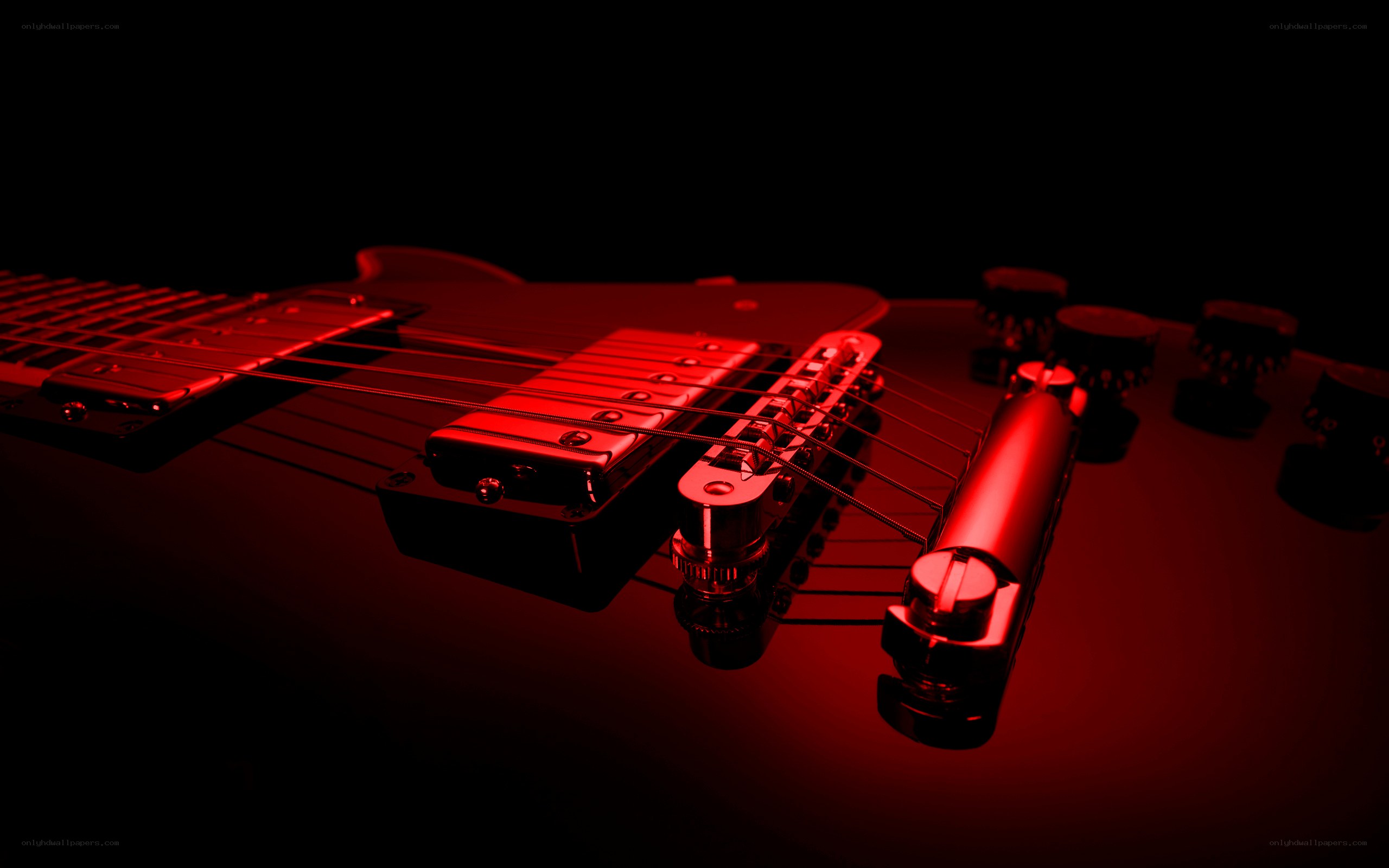 Electric guitar under red light
