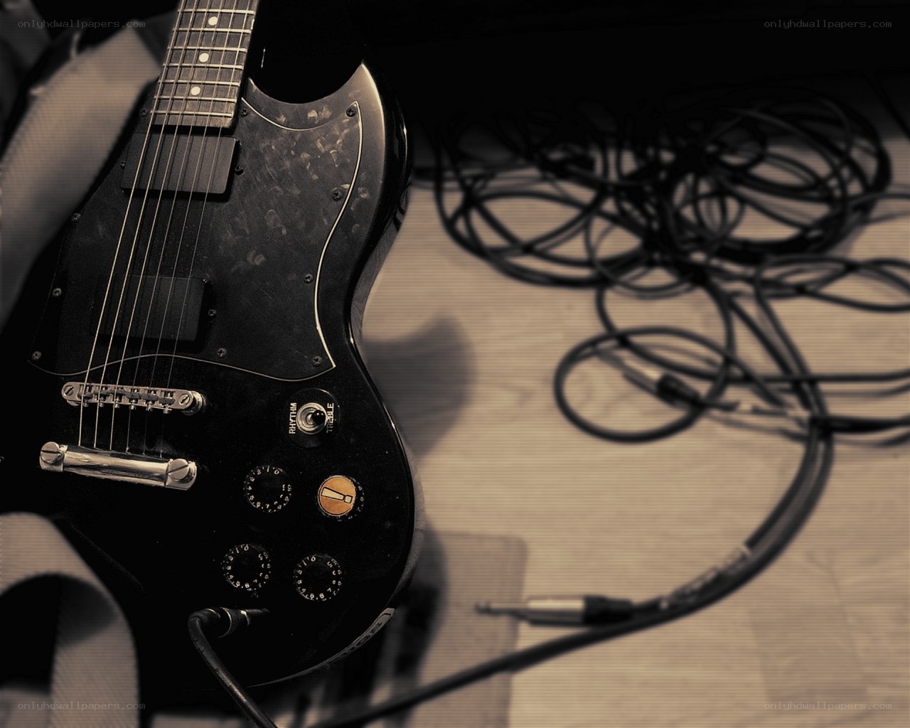 Electric guitar with cables
