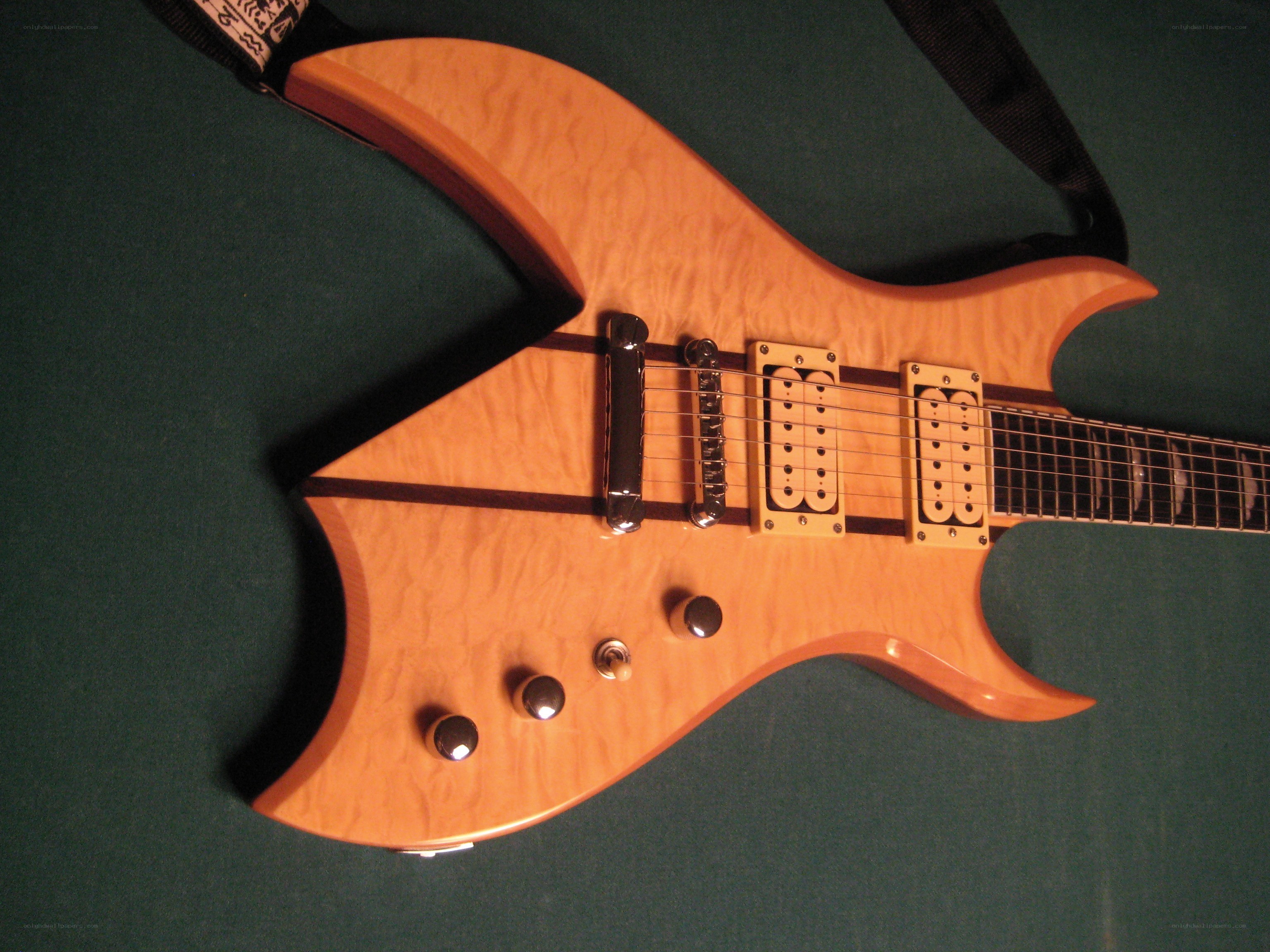 Electric guitar with flame maple top