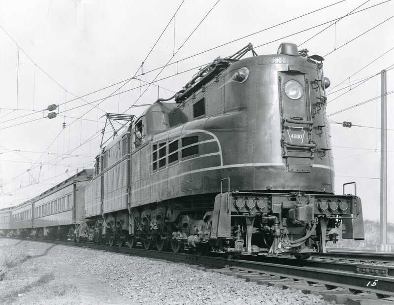 Electric locomotive pulling train