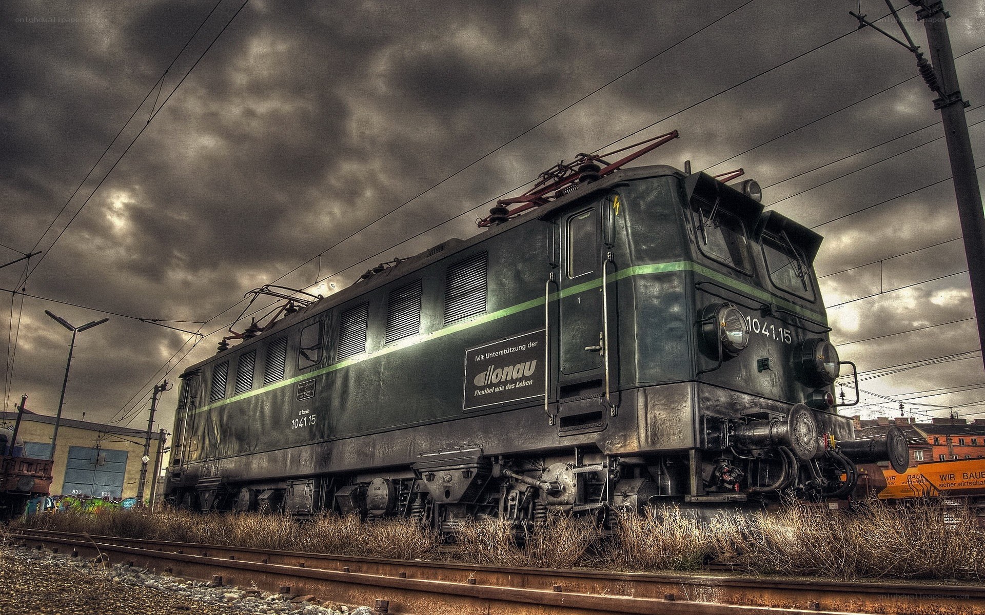 Electric locomotive under stormy sky