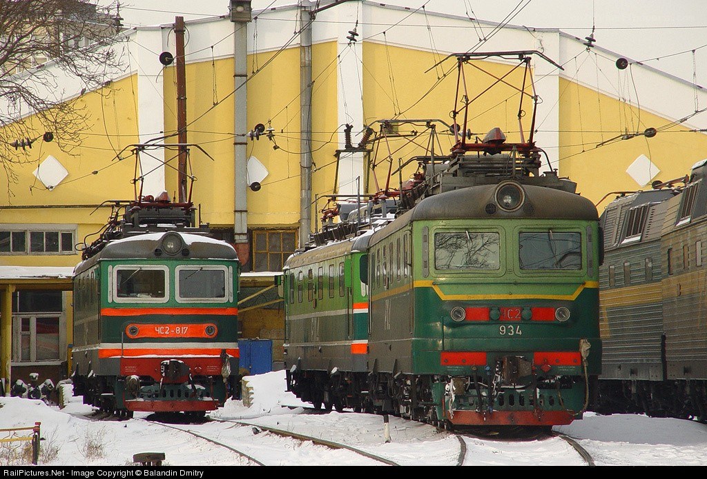 Electric locomotives in a rail yard