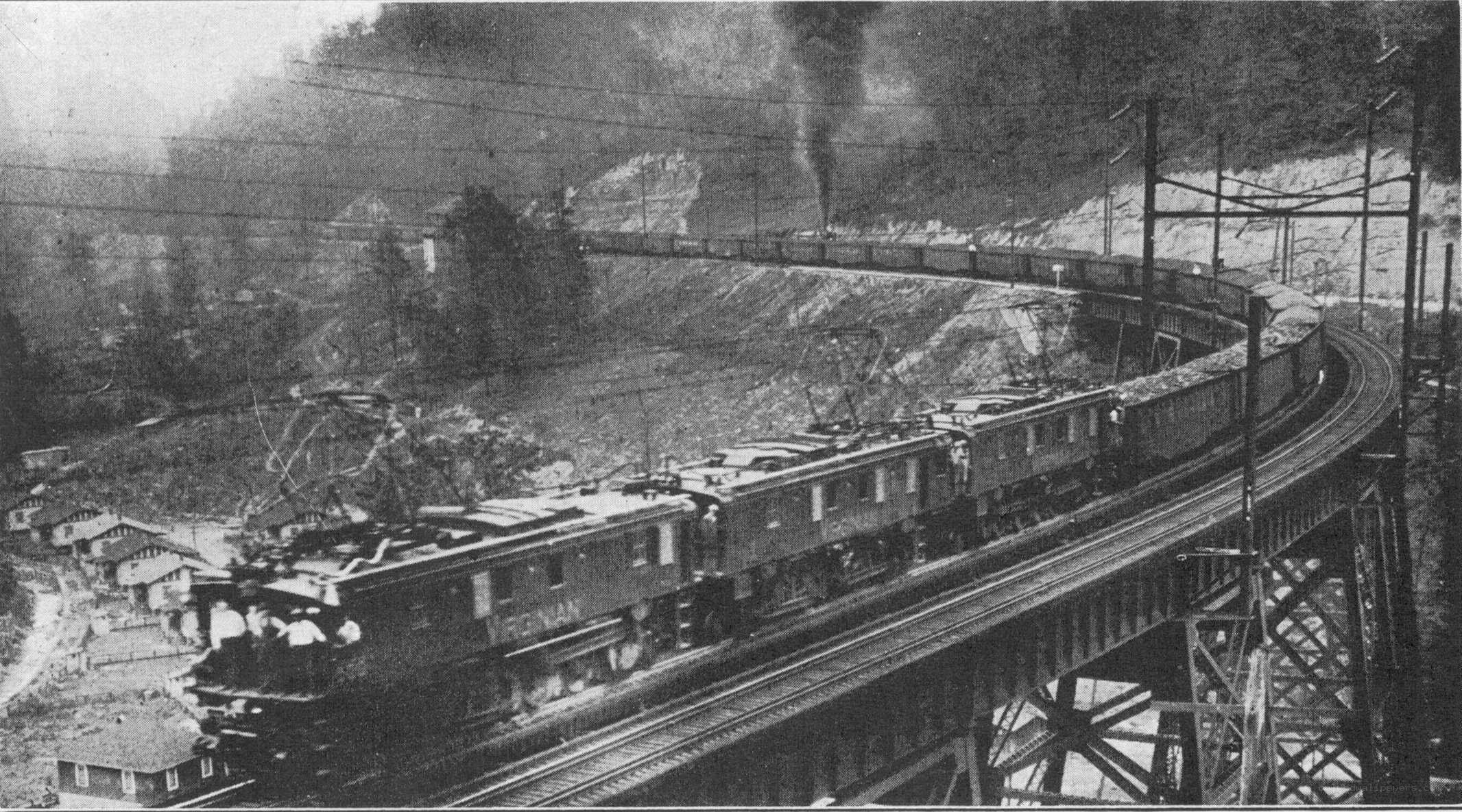 Electric train on a curved bridge