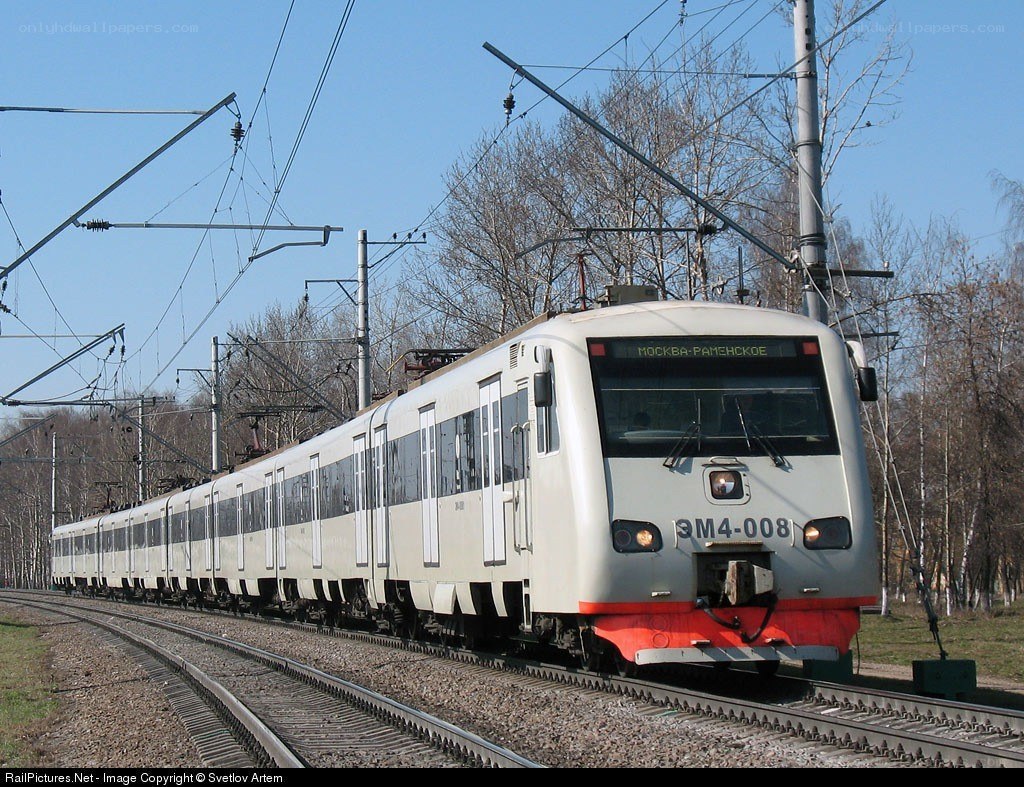Electric train on railway tracks