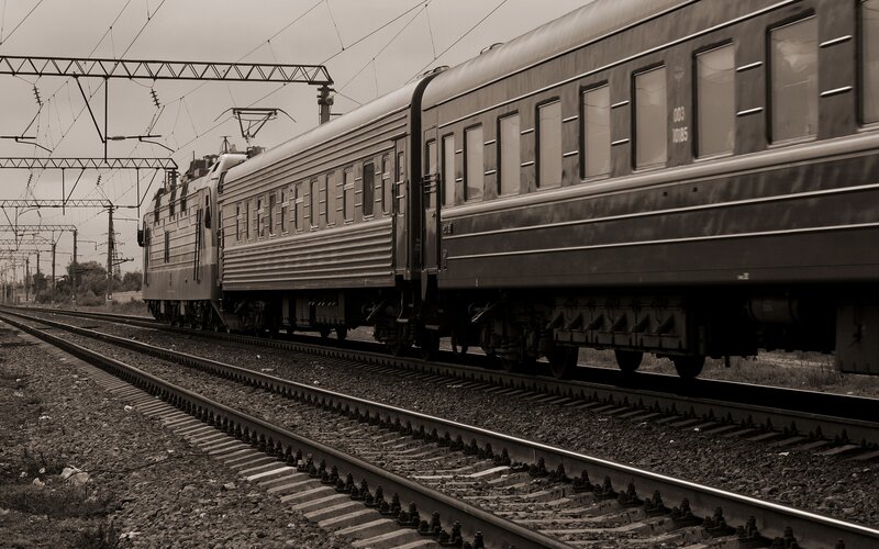 Electric train on railway tracks