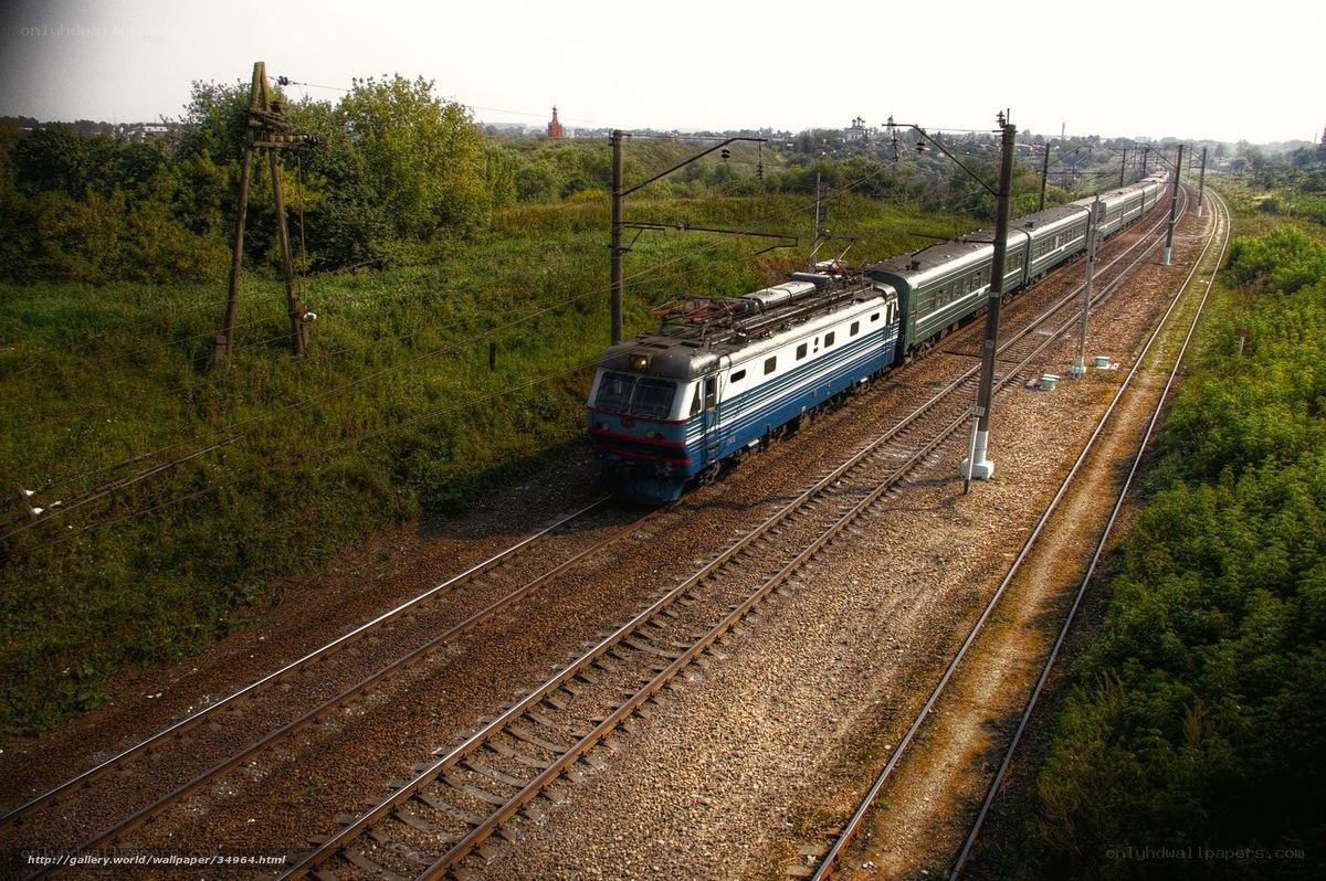 Electric train on rural tracks
