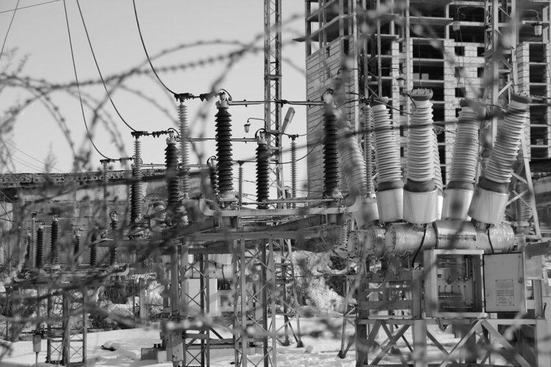 Electrical substation with construction in background