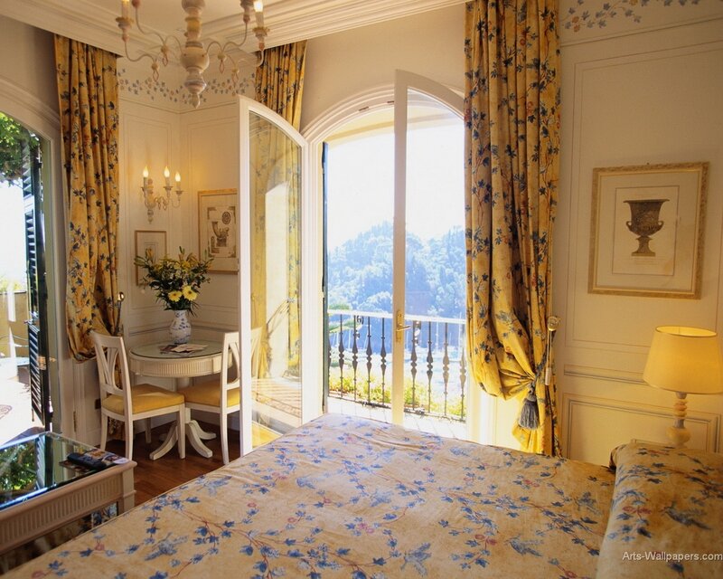 elegant bedroom with balcony view