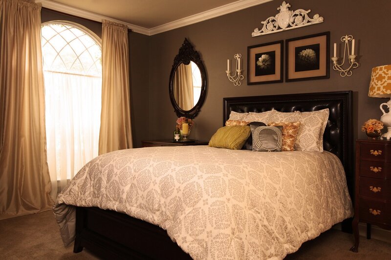 elegant bedroom with dark walls