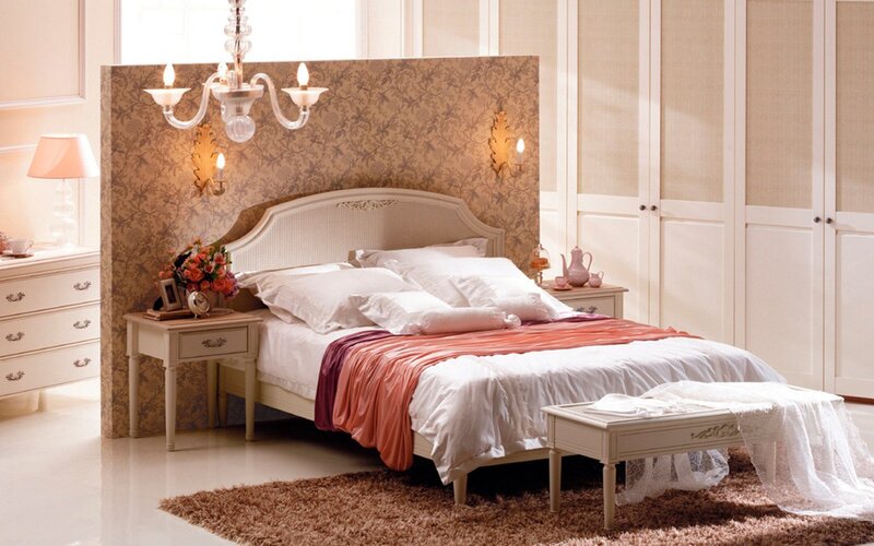 elegant bedroom with floral headboard