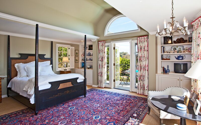 elegant bedroom with four-poster bed