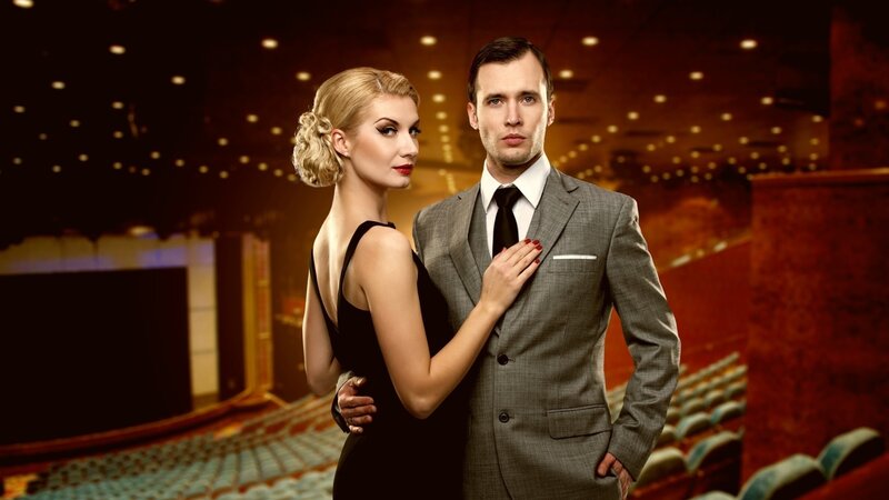 Elegant couple in theater