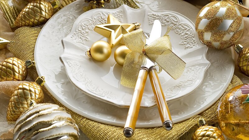 Elegant gold and white holiday table setting