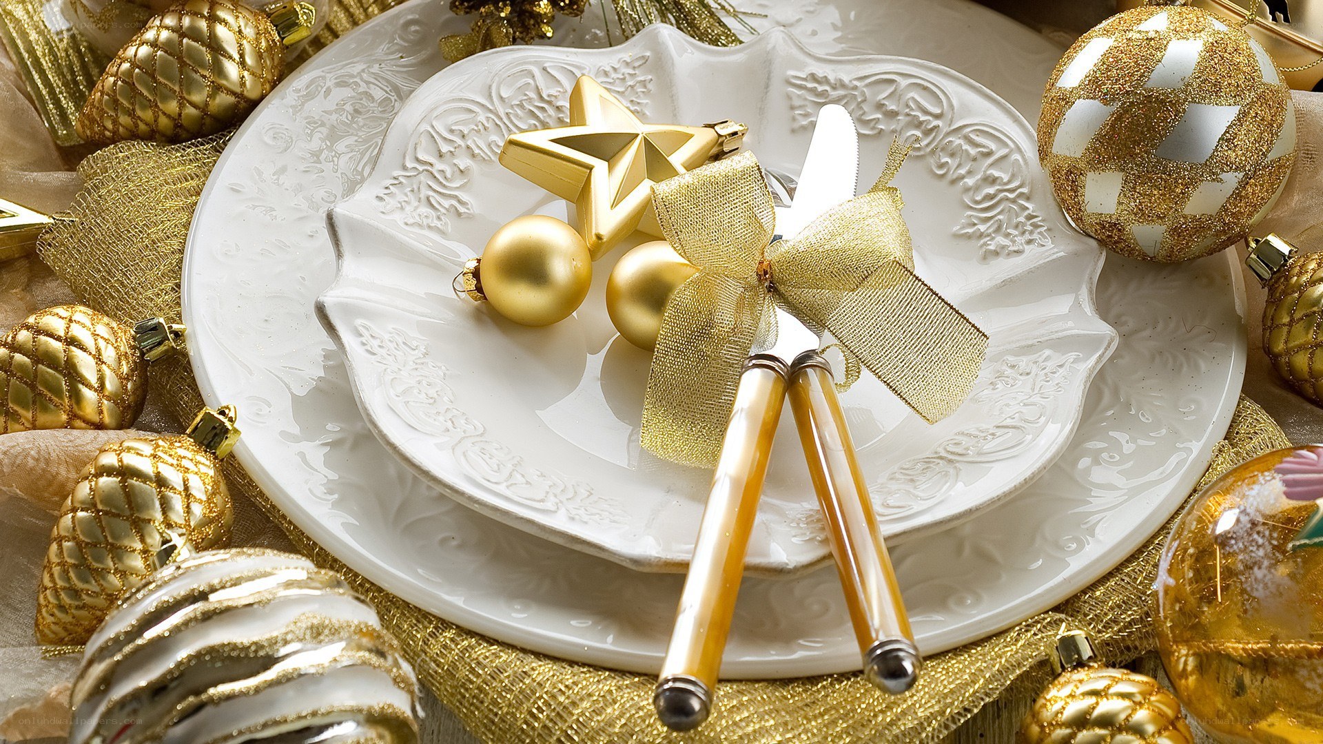 Elegant gold and white holiday table setting