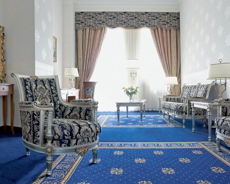 elegant living room with blue carpet
