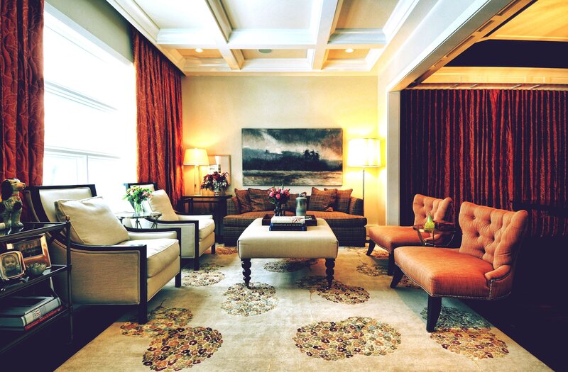 Elegant living room with red accents